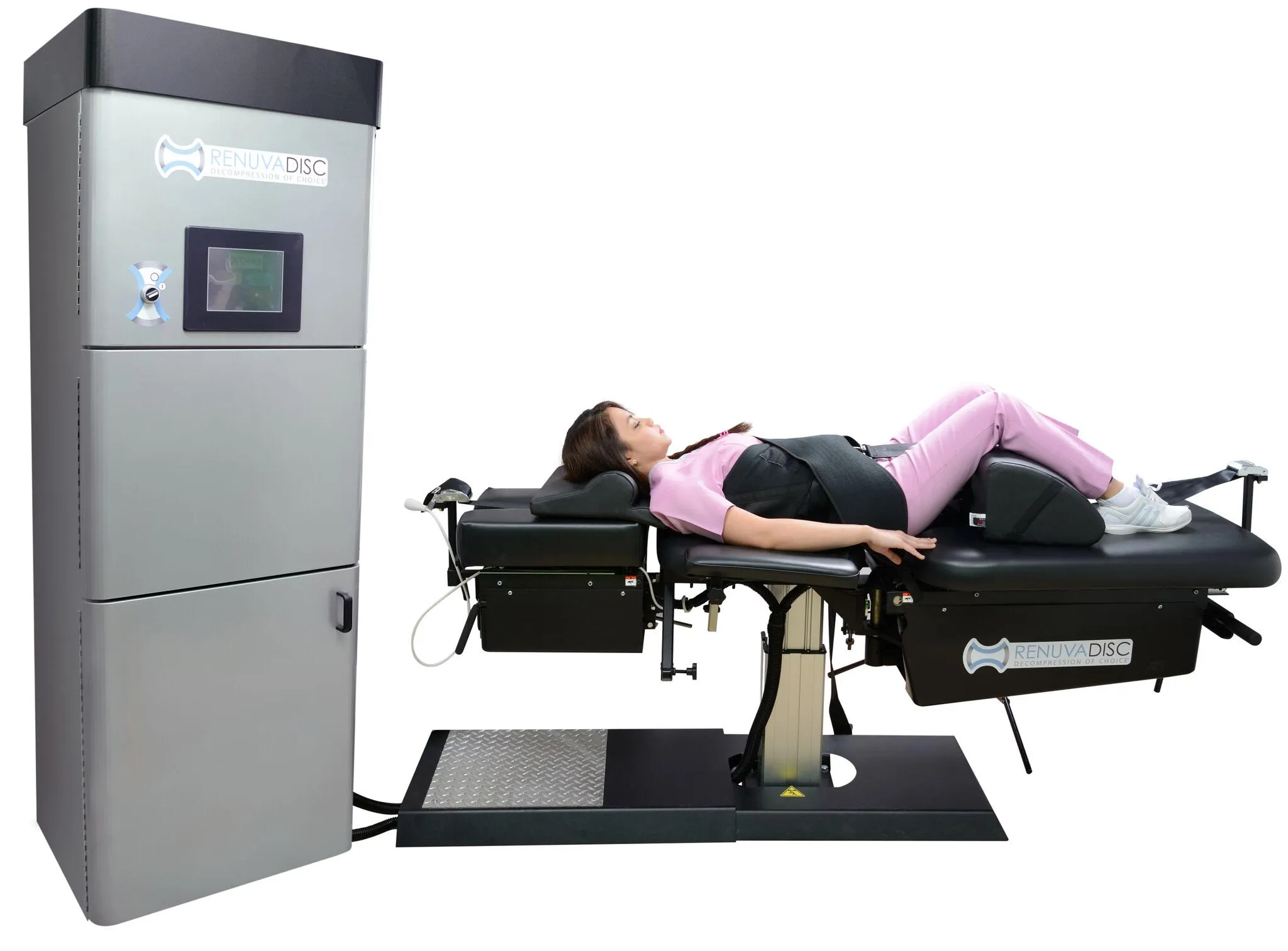 Patient lying on RenuvaDisc spinal decompression table in supine position